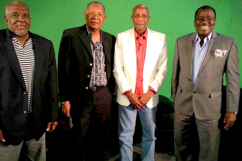 (L-R): Tim Lambkin, Selris Figaro, Steve David, and Selby Browne on the set of the Field of Dreams football show.