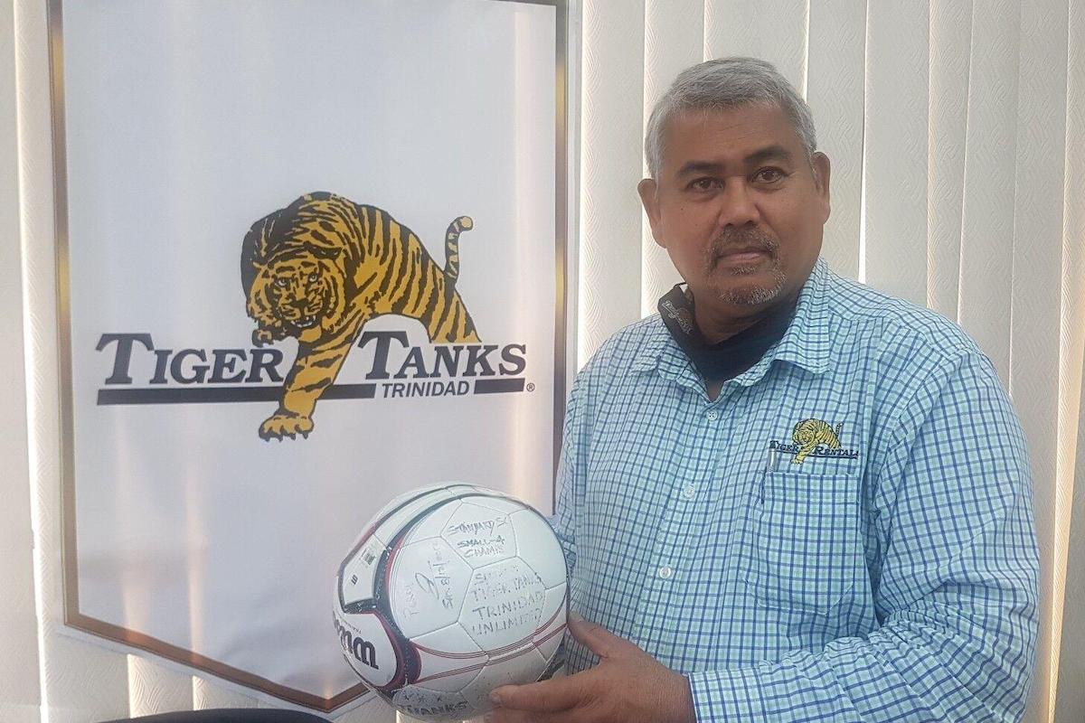 ‘LET’S PLAY’: General manager of sponsoring firm Tiger Tanks, Denis Latiff, holds one of the tournament balls. --Photo courtesy Rodeo Communications