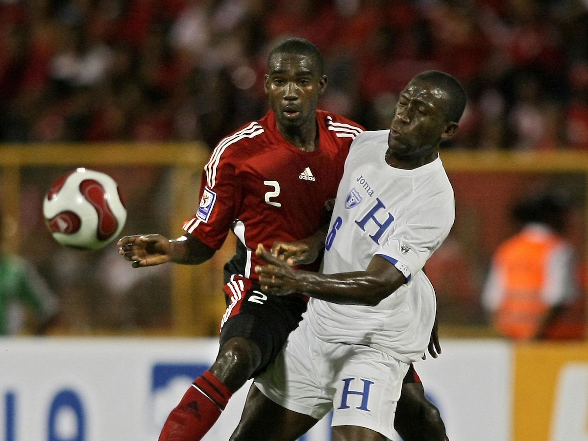 Trinidad and Tobago's Clyde Leon (L) vies for the ball with Honduras' Hendry Thomas during their FIFA World Cup South Africa-2010 qualifier football match at Hasely Crawford stadium in Port of Spain on March 28, 2009. (THOMAS COEX AFP PHOTO via Getty Images)