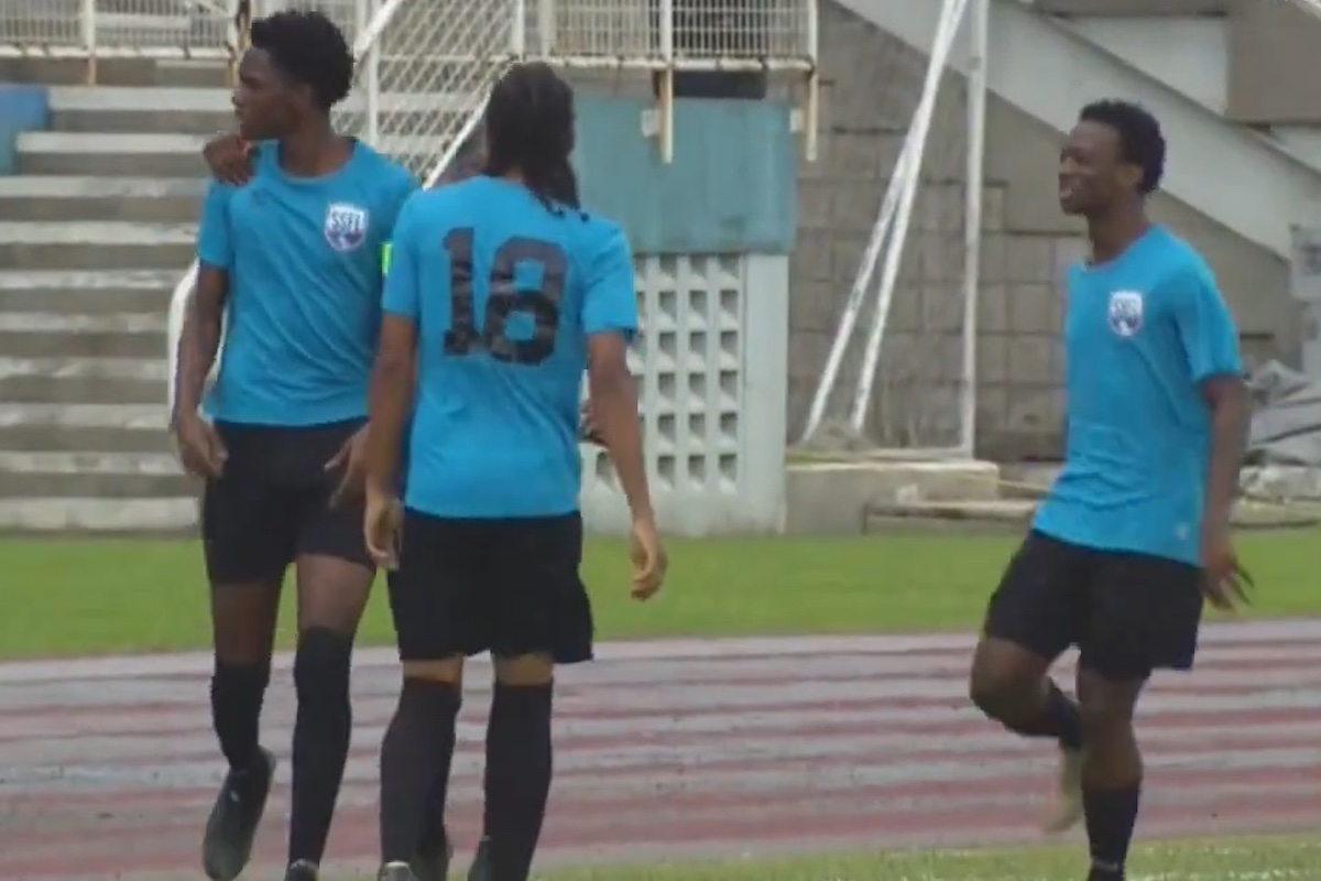Malick Secondary captain Lendelle Baptiste celebrates with teammates after scoring the opening goal against Presentation College San Fernando at At bolden Stadium on Saturday September 16th 2022.