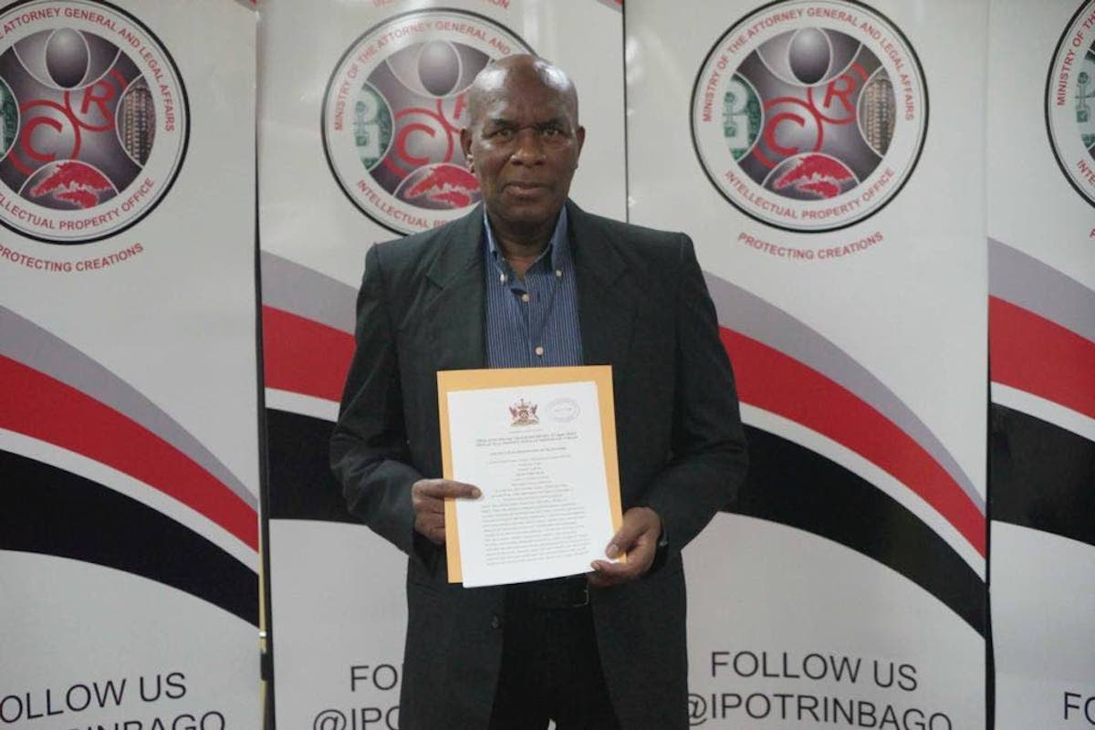 Selwyn Melville with his trademark certificate, for the Soca Warriors nickname, at the Intellectual Property Office, Port of Spain on Tuesday, September 13th 2022