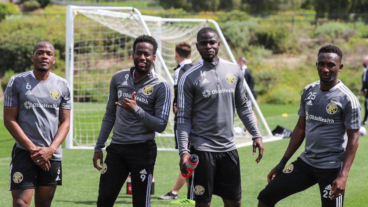 Columbus Crew's Kevin Molino (second from left)