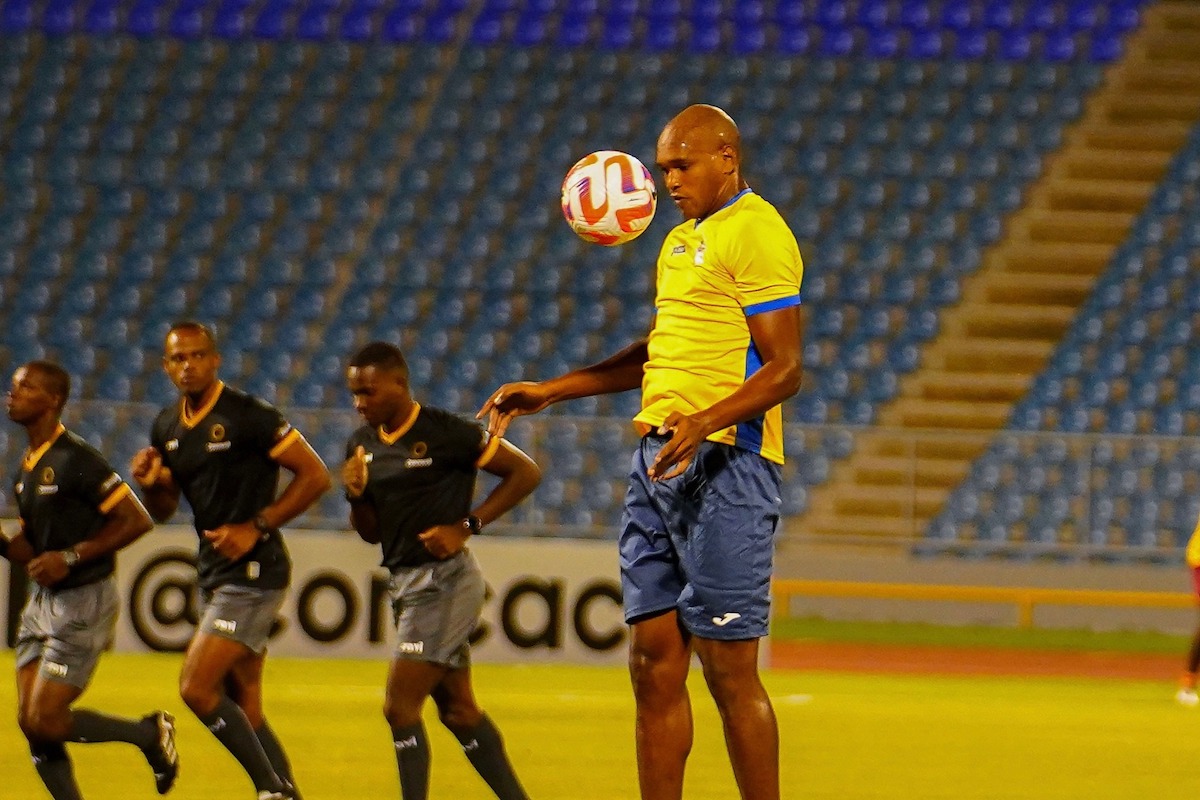 Defence Force's Brent Sam warms up before facing Cavalier FC of Jamaica in a Concacaf Caribbean Cup match at the Hasely Crawford Stadium on August 24th 2023.