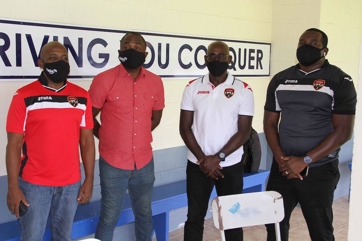 T&T national coach former national captains, Clayton Morris, second from right, and Angus Eve, second from left, together with Wayne "Barney" Shepphard,left, and Richard Hood during a media conference at Fatima College Ground, Mucurapo Road on September 4. PHOTO: Anthony Harris