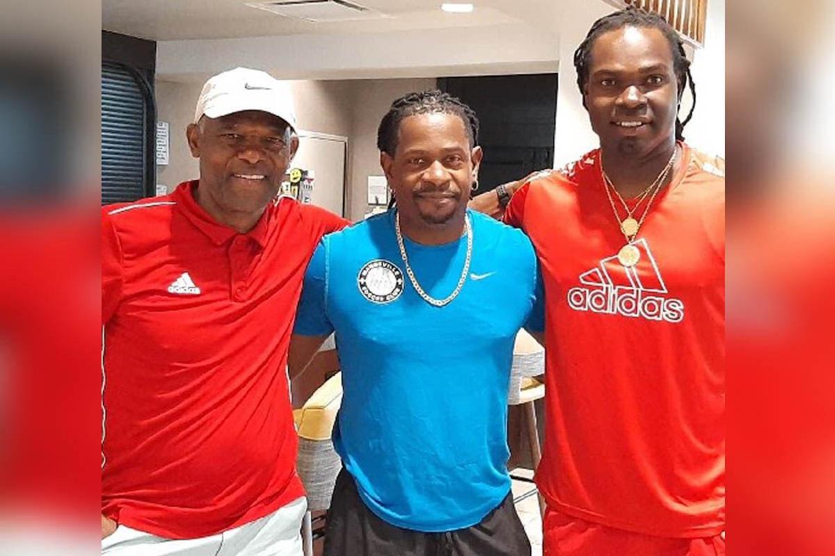 LENDING SUPPORT: Left to right, former players Leroy Spann, Glen Benjamin and Nicholas Benjamin in Dallas, Texas, USA, after visiting the Trinidad and Tobago senior men’s football team camp at the CONCACAF Gold Cup