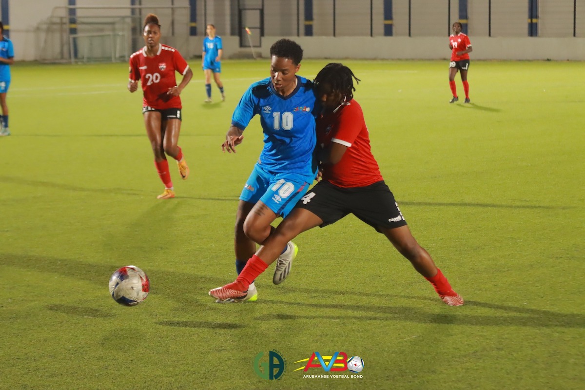 Trinidad and Tobago's Orielle Martin challenges an Aruban player for the ball during a match at the Stadion Rignaal 'Jean' Francisca, Willemstad, Curaçao on Sunday, June 2nd 2024.