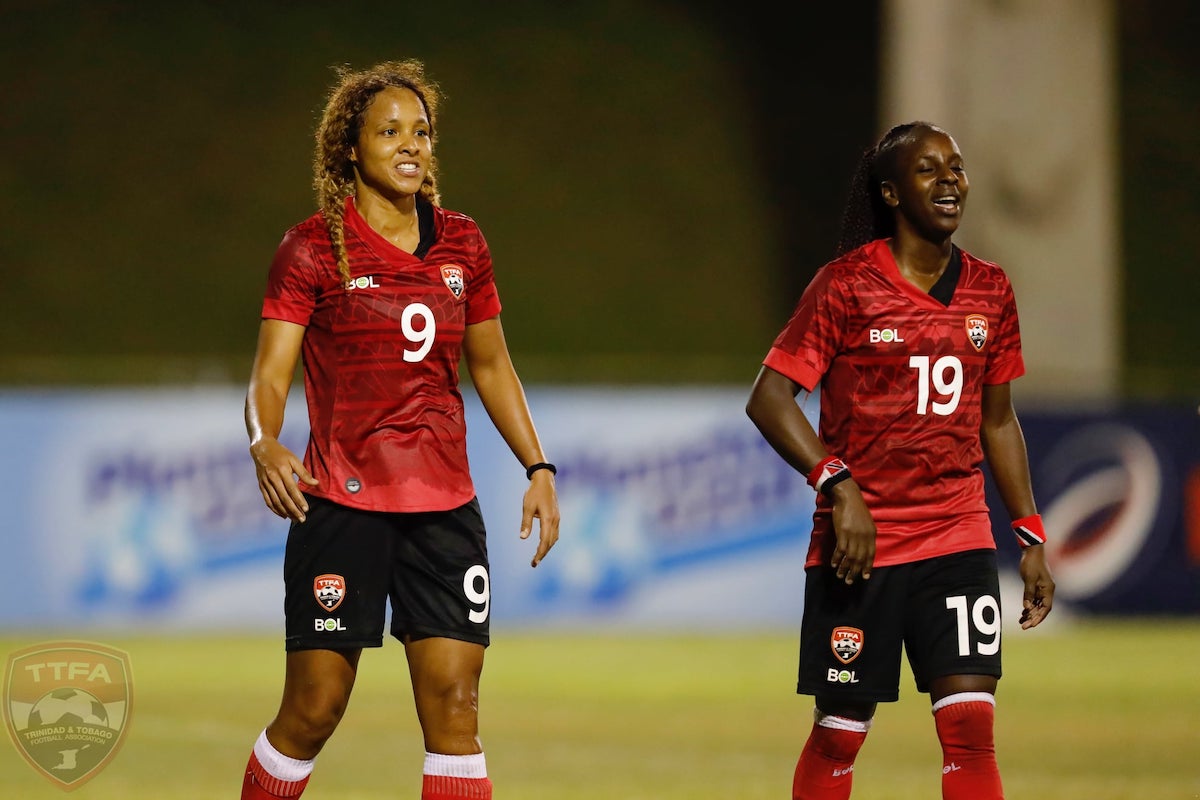 Maylee Attin-Johnson (left) and Kennya Cordner (right) make their way off the field after an International Friendly between Dominican Republic and Trinidad Tobago at San Cristóbal, Dominican Republic on  November 26th 2021.