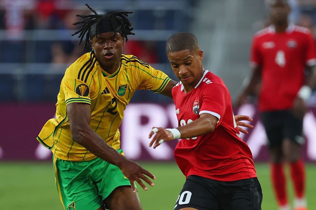 Kaile Auvray #20 of Trinidad & Tobago controls the ball against Dexter Lembikisa #2 of Jamaica in the second half during 2023 CONCACAF Gold Cup at Citypark on June 28, 2023 in St Louis, Missouri. (Photo by Dilip Vishwanat/Getty Images)