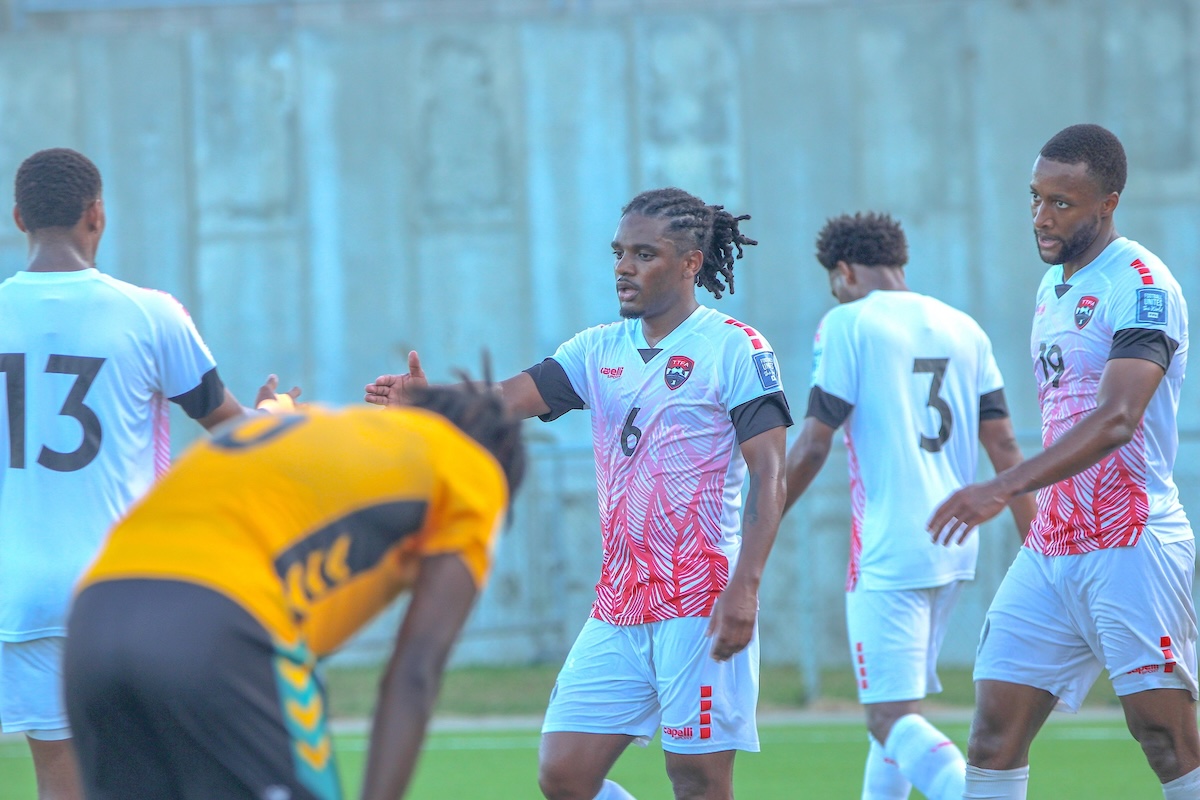 Trinidad and Tobago's Reon Moore (#13), Duane Muckette (#6), Triston Hodge (#3), and Malcolm Shaw (#19) react after scoring a goal during a 2026 Concacaf Qualifier against Bahamas at the SKNFA Technical Centre, Basseterre, St. Kitts and Nevis on Saturday, June 8th 2024.