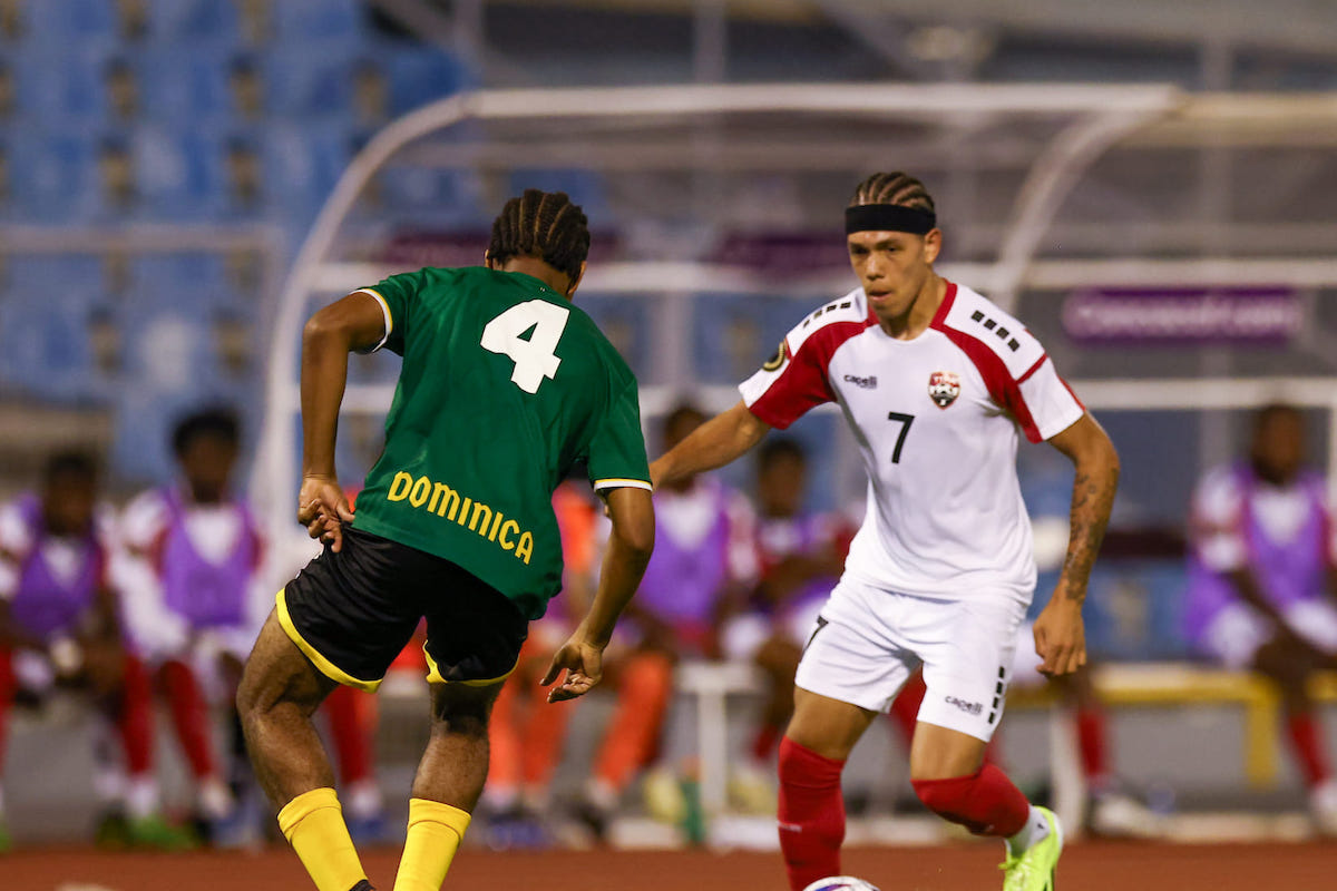 Trinidad and Tobago's Rio Cardines (#7) takes on Dominica's Laquante Alphonse (#4) during a Concacaf U-20 qualifier match at the Hasely Crawford Stadium, Port of Spain on Sunday, February 25th 2024.