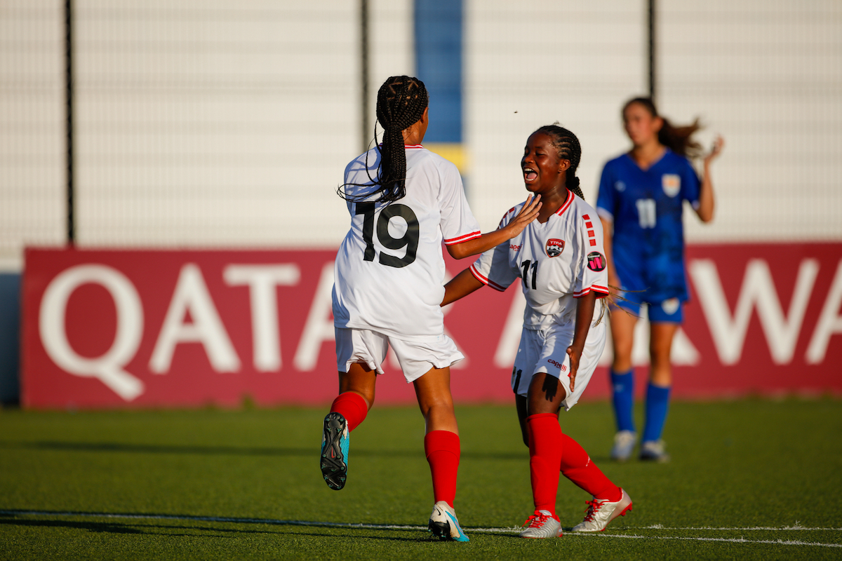 Trinidad and Tobago's Daneelyah Salandy (#19) is congratulated by Mariah Williams (#11) after scoring the fourth goal in a 4-0 win over Cayman Islands in a Concacaf Women's Under-17 Qualifier at Stadion Rignaal Jean Francisca, Willemstad, Curaçao on Monday, August 28th 2023.