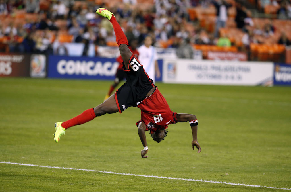Kennya Cordner celebrates after scoring against Guatemala at the 2014 CONCACAF Women's Championship