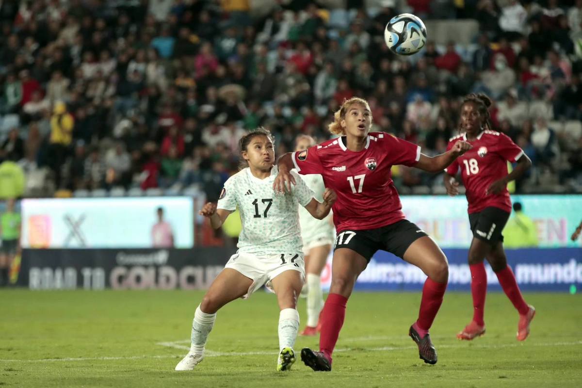 Trinidad and Tobago midfielder Sarah De Gannes battles for the ball with Mexico's Natalia Mauleón during a Concacaf Women's Gold Cup Qualifying match at Estadio Hidalgo, Pachuca, Mexico on Tuesday, September 26th 2023.