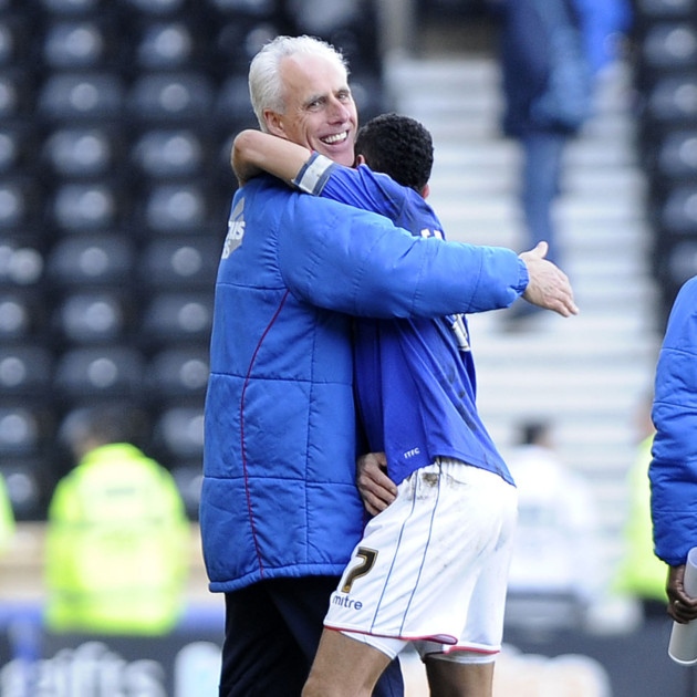 Mick McCarthy embraces Carlos Edwards after his match-winning strike at Derby