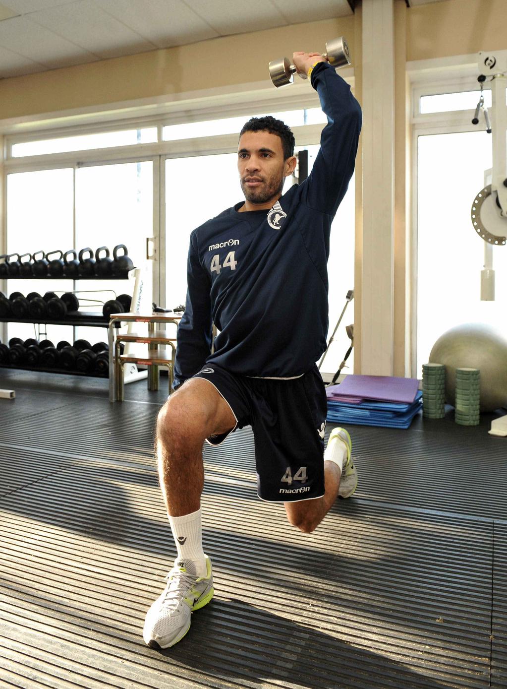 Carlos Edwards in the gym rehabilitating his knees
