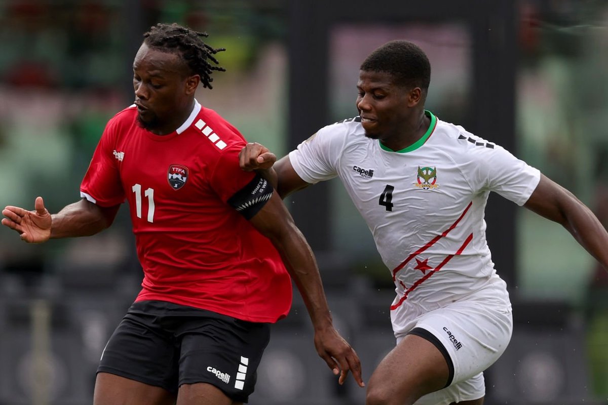 Levi García #11 of Trinidad and Tobago controls the ball against Andre Burley #4 of Saint Kitts and Nevis during the second half at DRV PNK Stadium on June 25, 2023 in Fort Lauderdale, Florida. (Photo by Megan Briggs/Getty Images)