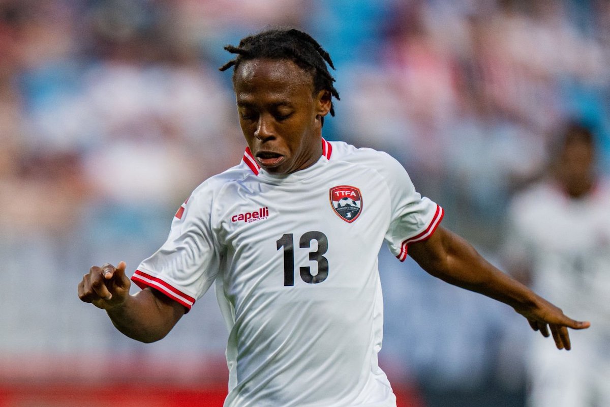 Real Gill #13 of Trinidad and Tobago dribbles the ball during their game against the United States at Bank of America Stadium on July 02, 2023 in Charlotte, North Carolina. (Photo by Jacob Kupferman/USSF/Getty Images for USSF)