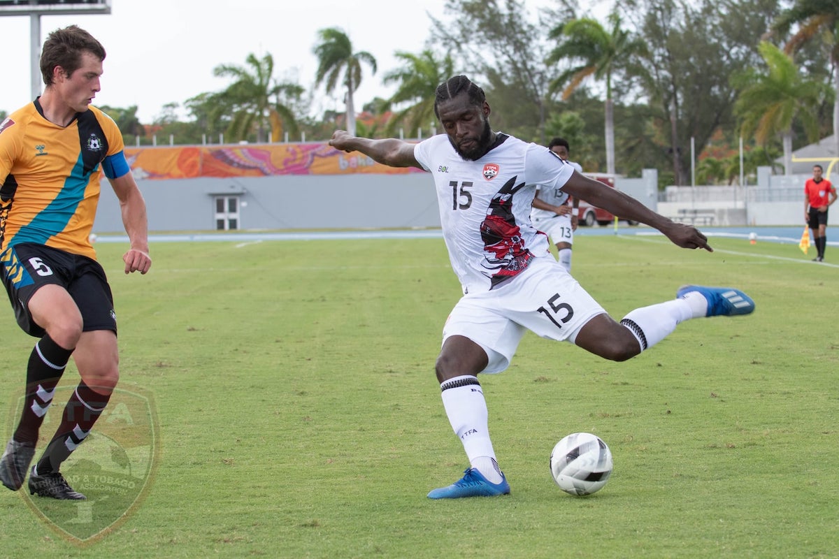 Trinidad and Tobago defender Neveal Hackshaw about to cross the ball during a 2022 FIFA World Cup Qualifier against Bahamas at the Thomas A. Robinson Stadium, Nassau, Bahamas, on June 5th 2021.
