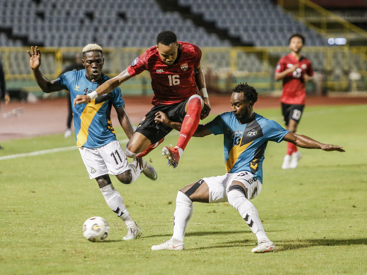Trinidad and Tobago defender Alvin Jones (#16) eludes two Bahamian players during a 2022/23 Group C Concacaf Nations League B match at the Hasely Crawford Stadium in Port of Spain, Trinidad and Tobago on Monday, June 6th 2022.