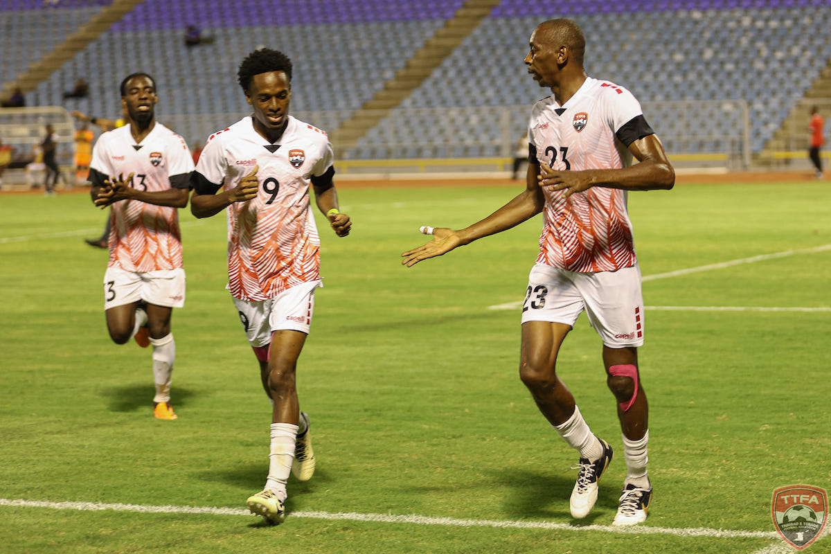 Trinidad and Tobago's Ezekiel Kesar (#9) and Kevon Woodley (#23) share a moment after the latter scores against Guayana for the second consecutive game at the Hasely Crawford Stadium, Mucurapo on Wednesday, May 15th 2024.
