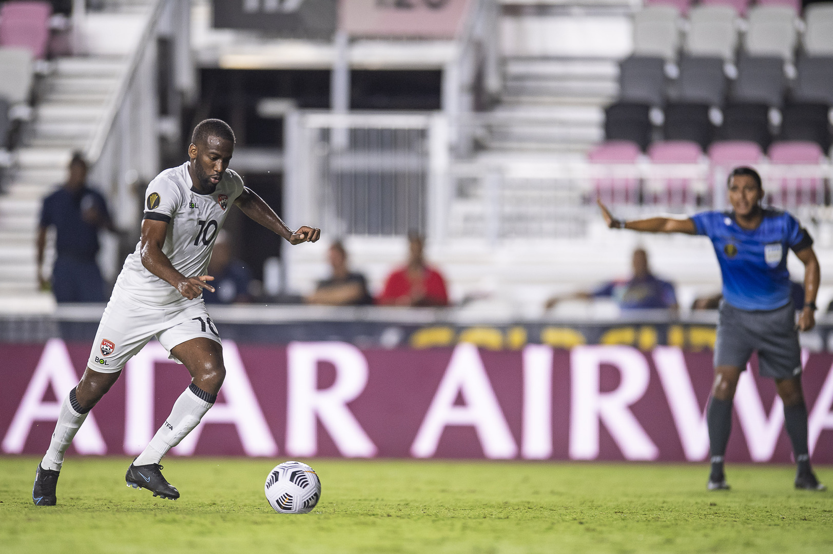 Trinidad and Tobago's Kevin Molino takes a penalty during a 2021 Concacaf Gold Cup Preliminary Round match against Montserrat at the DRV PNK Stadium, Ft. Lauderdale, FL on Friday, July 2nd 2021.