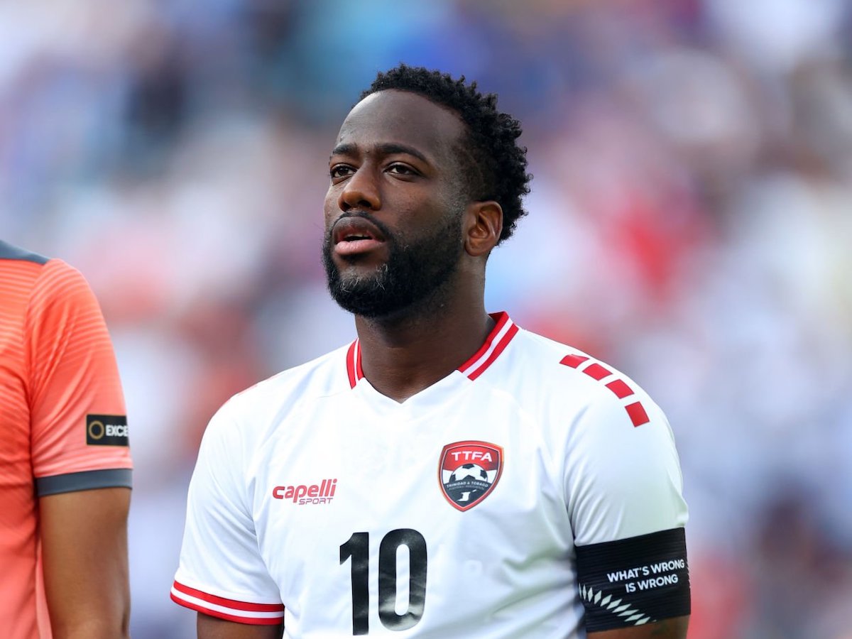 Kevin Molino #10 of Trinidad and Tobago during the playing of the national anthem prior to playing the United States in a Group A - 2023 Concacaf Gold Cup match at Bank of America Stadium on July 2, 2023 in Charlotte, North Carolina. (Photo by Andy Mead/USSF/Getty Images for USSF)