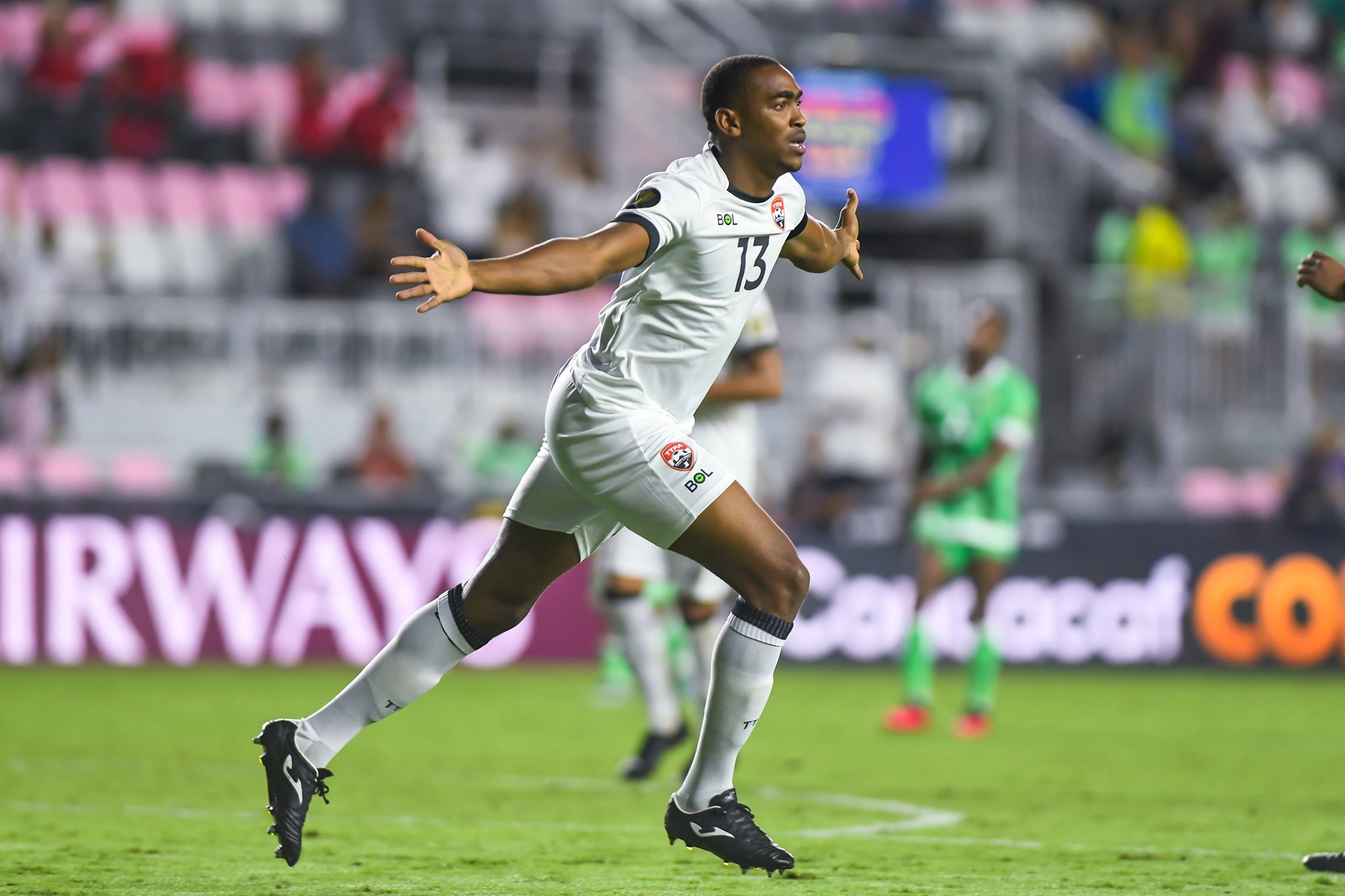 Trinidad and Tobago's Reon Moore celebrates after scoring a goal during a 2021 Concacaf Gold Cup Preliminary Round match against Montserrat at the DRV PNK Stadium, Ft. Lauderdale, FL on Friday, July 2nd 2021.
