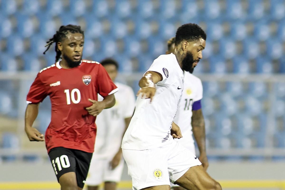 T&T midfielder Duane Muckette (left) vies for possession of the ball against Curaçao during the Concacaf Nations League match, on September 7th 2023, at the Hasely Crawford Stadium, Port of Spain. T&T won 1-0.