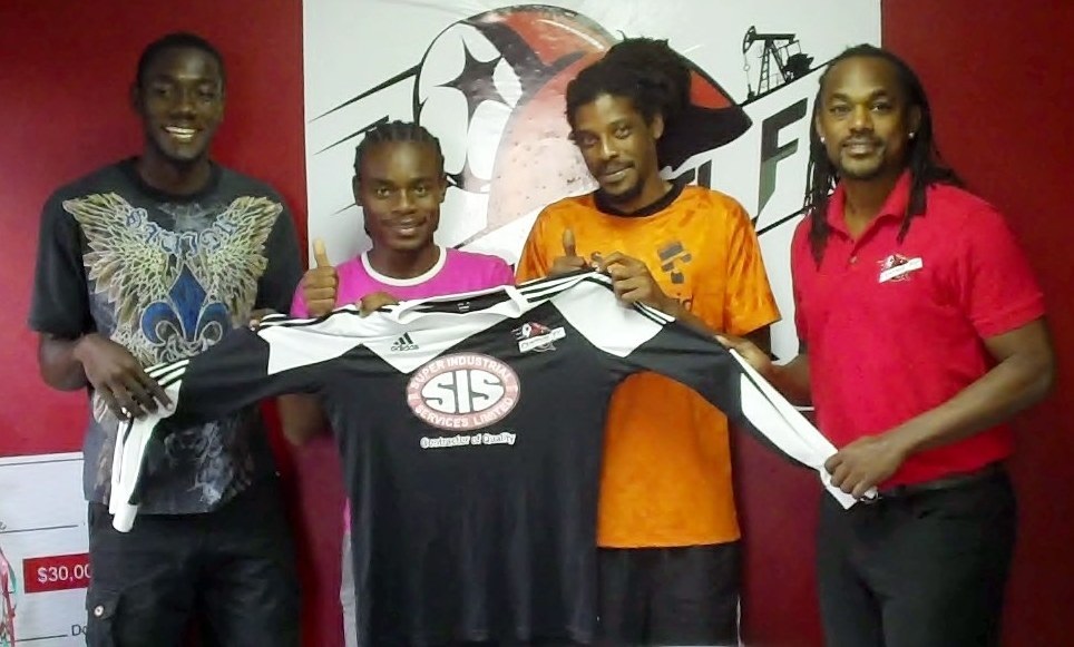 (L-R) Rundell Winchester, Darren Mitchell and Marvin Oliver with Central F.C. Managing Director Brent Sancho