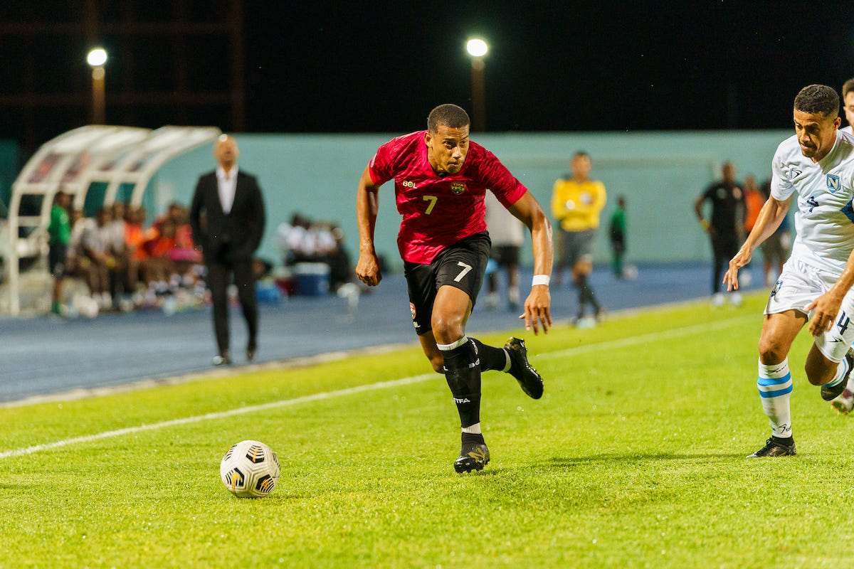 Trinidad and Tobago's Ryan Telfer (left) on the move during a Concacaf Nations League Group C match against Nicaragua at Dwight Yorke Stadium, Bacolet, Tobago on Monday, March 27th 2023.