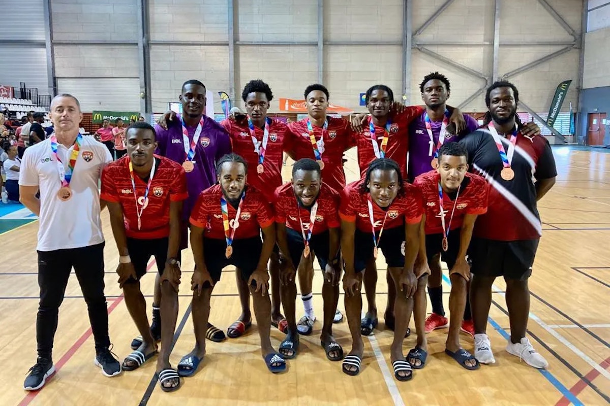 Trinidad and Tobago's U-23 Futsal team pose with their bronze medals after defeating Martinique 8-2 at the 2022 Caribbean Games on July 3rd 2022.