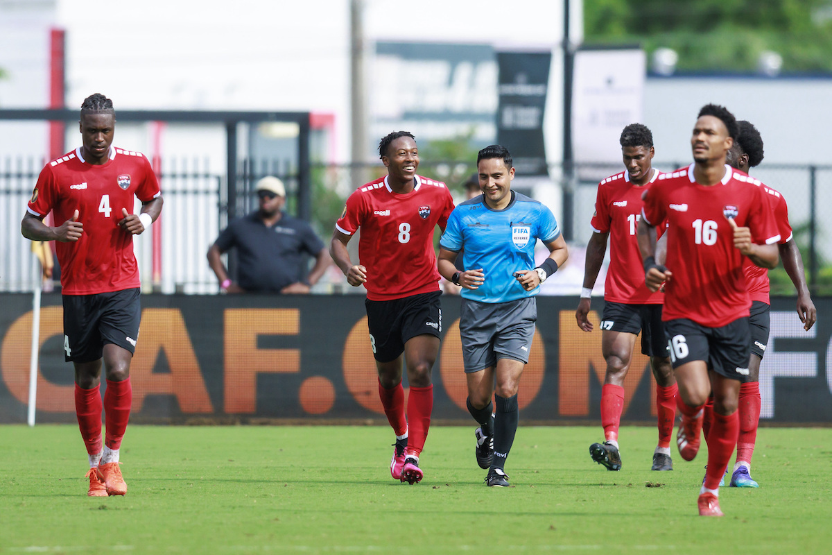 Trinidad and Tobago players celebrate after Alvin Jones (#16) scores the opening goal against St. Kitts and Nevis in a Concacaf Gold Cup Group A match at DRV PNK Stadium, Ft. Lauderdale, FL on Sunday June 25th 2023.