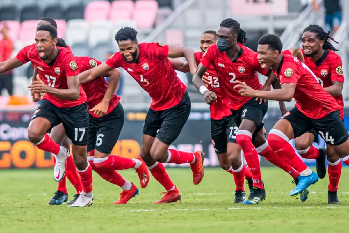 Trinidad and Tobago players celebrate after defeating in a dramatic 8-7 penalty shootout to French Guiana following a 1-1 draw in the Second Round of the 2021 Gold Cup Prelims on July 6 2021, at DRV PNK Stadium in Fort Lauderdale, Florida.