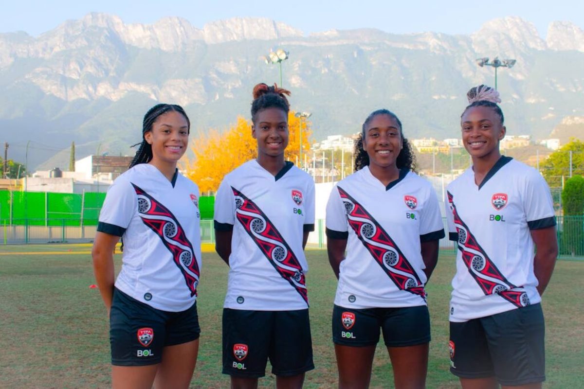 Trinidad and Tobago Women players pose with the new BOL kit. (L-R) Chelsi Jadoo, Maria-Frances Serrant, Cayla McFarlane, Liana Hinds