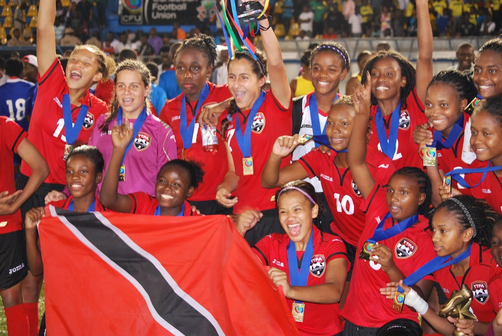 T&T Women's U17 Team members proudly display their national flag.